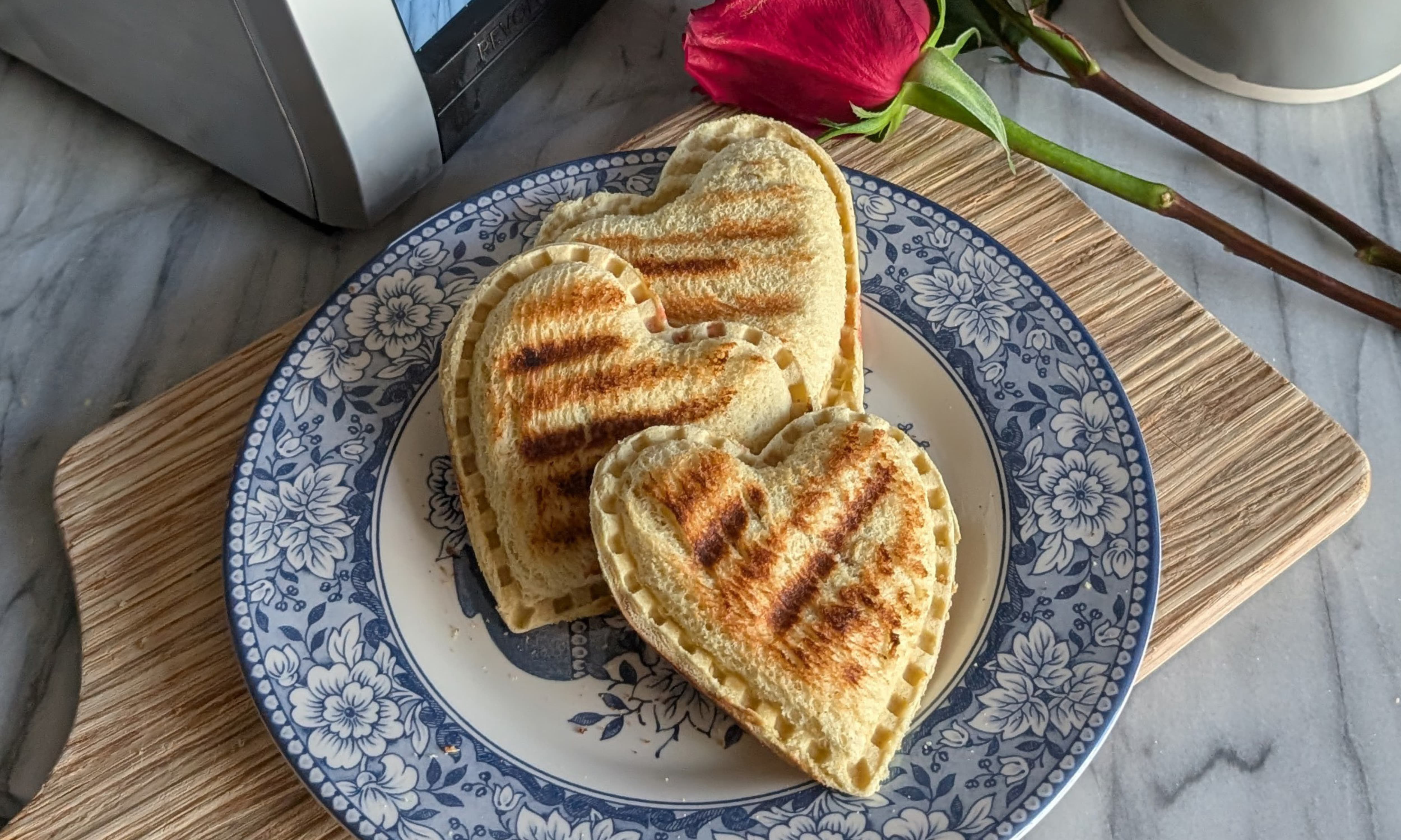 Homemade bread hand pies filled with fruit pie filling and cooked in a toastie press