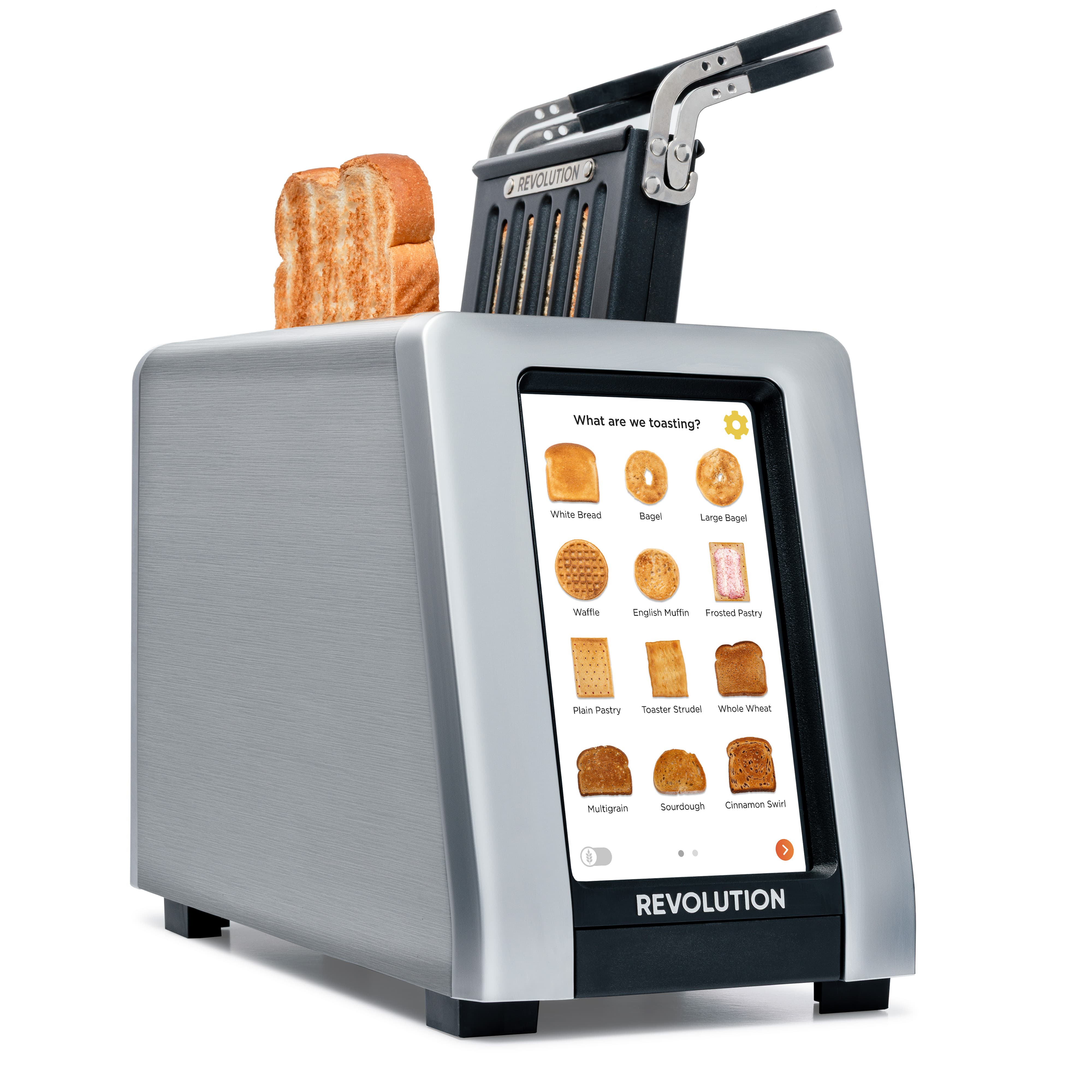 The Revolution Cooking R180 Connect Plus Smart Toaster + Toastie Press features a silver design with a digital touchscreen showing bread options and two slices popping out, with the “Revolution” brand name displayed at the bottom of the screen.