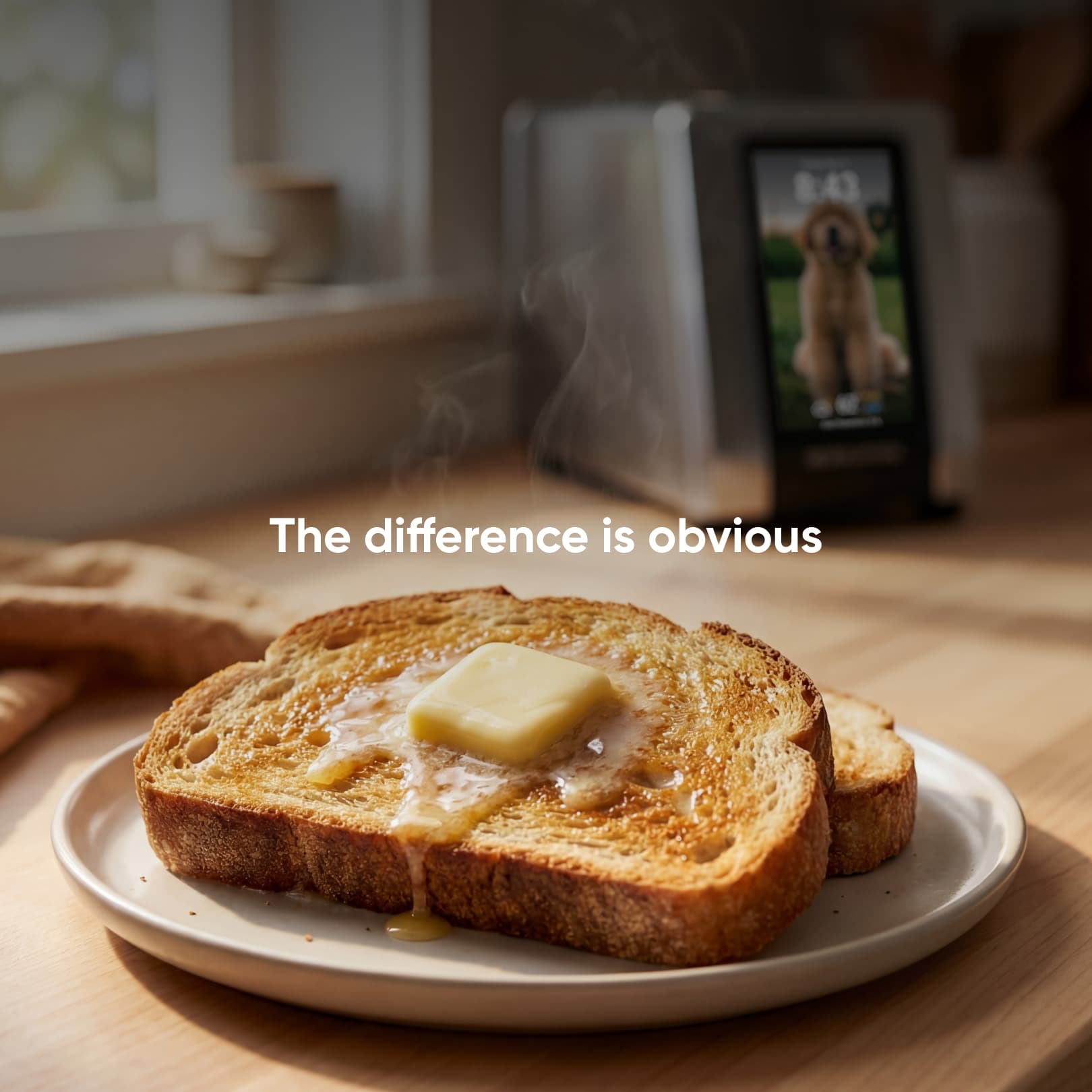 Two slices of toast on a plate, one with melting butter and rising steam. In the background, a Revolution Cooking R180 Connect Plus Smart Toaster displays a dog photo. Text reads: "The difference is obvious.