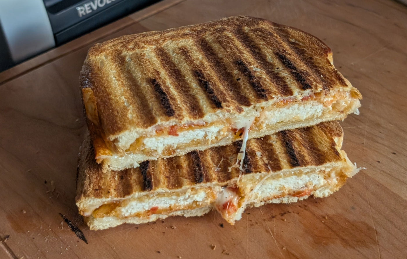 Chicken Nugget Parmesan Sandwich with marinara and provolone toasted golden in the Revolution Toastie Press™