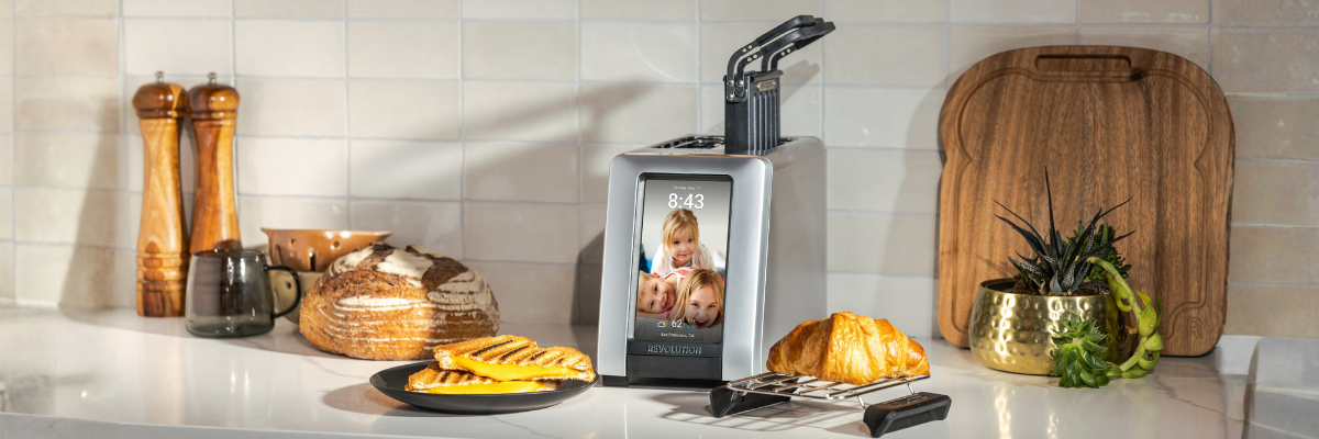 Revolution Smart Toaster on a kitchen counter with warm, golden toast—styled for Hanukkah gifting