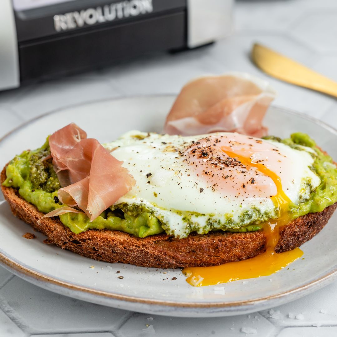 Peggsto toast with a fried egg and prosciutto.