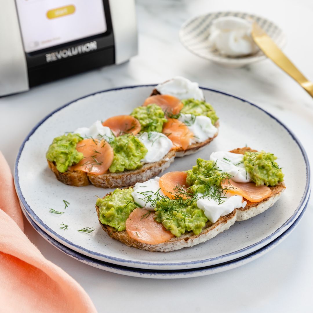 Toast, lox, avocado, and cream cheese in a checkered pattern.