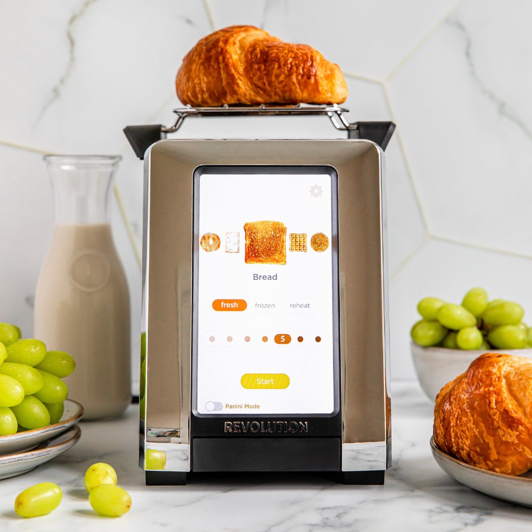 Revolution InstaGLO R180 toaster with warming rack and croissant.