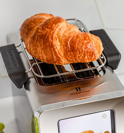 Warming rack accessory with croissant. 