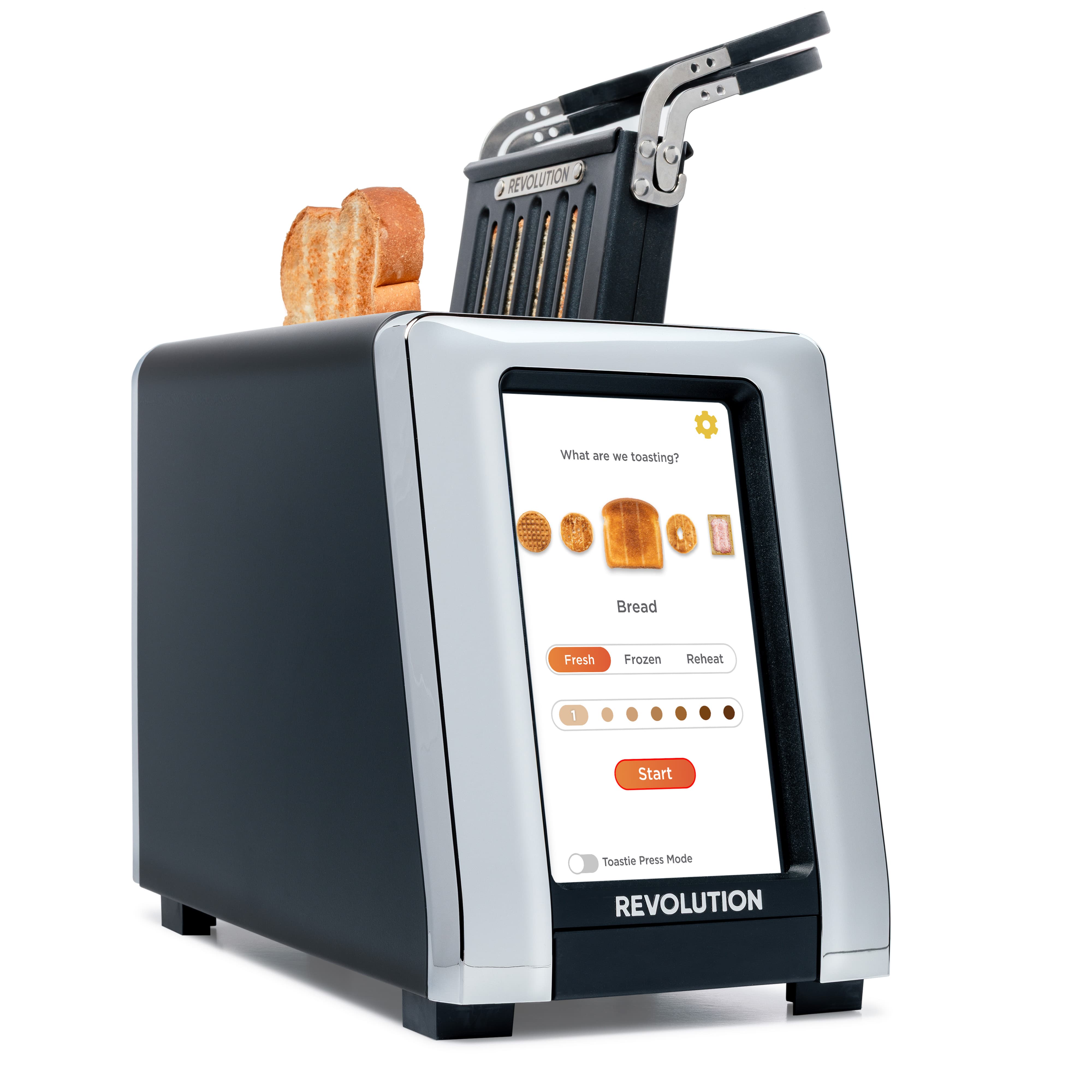 The Revolution Cooking R180 Connect Matte Black + Toastie Press toaster features a touchscreen display with bread toasting options and two slices inside. “REVOLUTION” appears on the bottom front of the toaster.