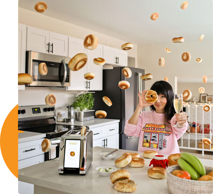 Revolution InstaGLO R180 Toaster. Multiple bagels floating in kitchen.  - Mobile