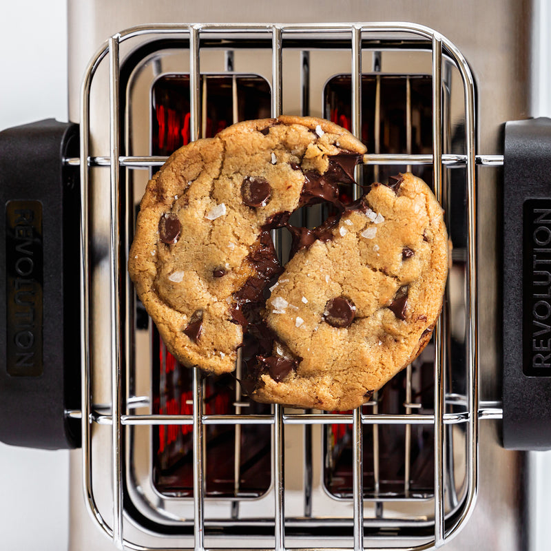 top down shot of the Revolution Toaster with the warming rack and a melty cookies