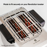 top of toaster and warming rack on top. Text says "made to fit securely  on your Revolution Toaster. Toaster sold separately"